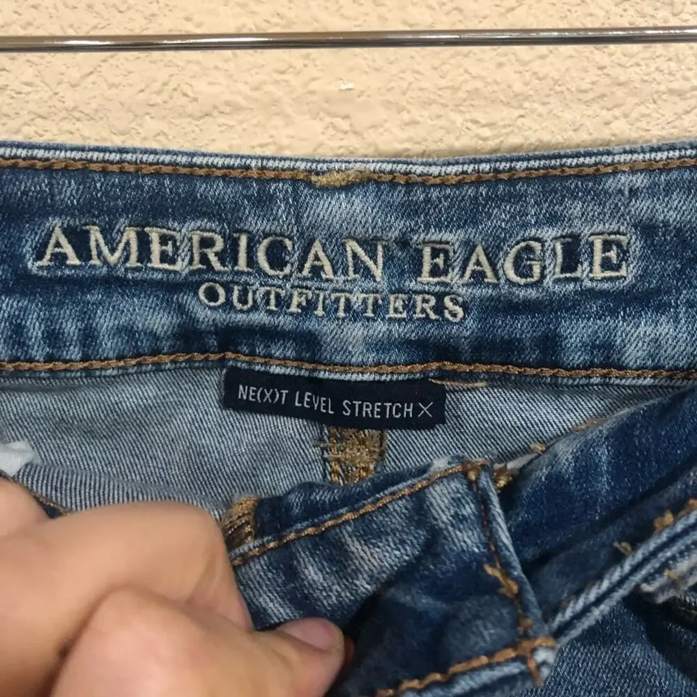 American Eagle Outfitters AEO distressed medium blue wash high rise mini skirt